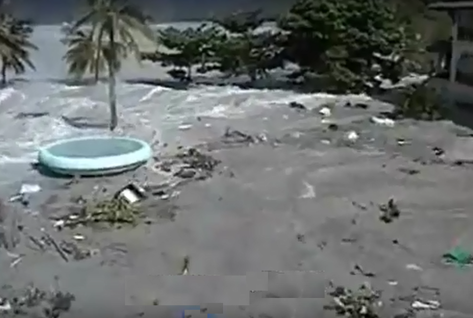 Tsunami waves engulf grounds of a hotel, Phi Phi Island