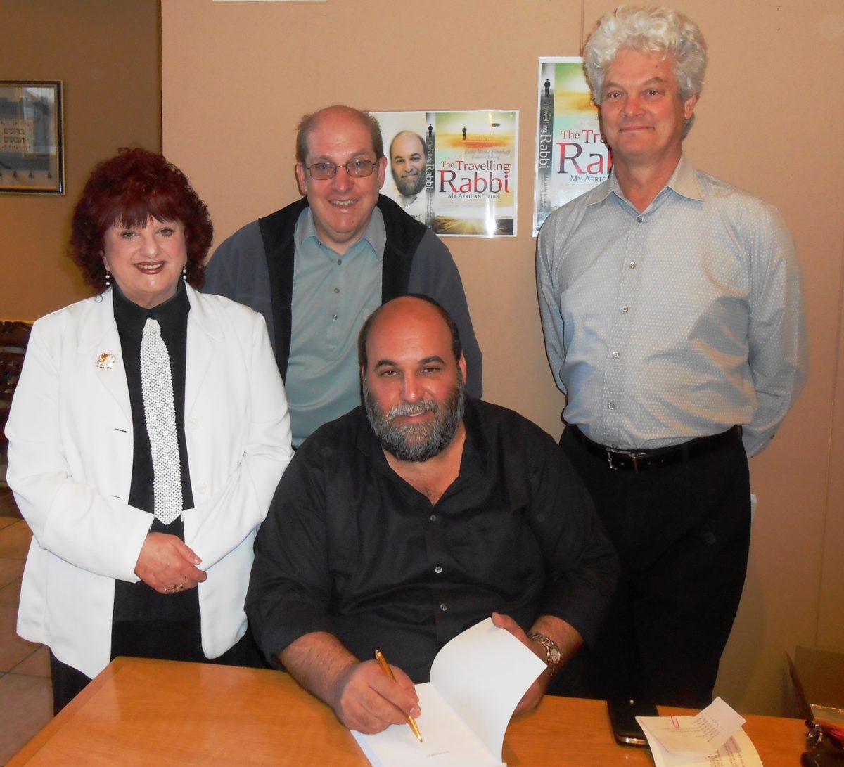 Suzanne Belling, with co-writer Rabbi Moshe Silberhaft and others at the launch of The Travelling Rabbi: My African Tribe, August 2012. . 