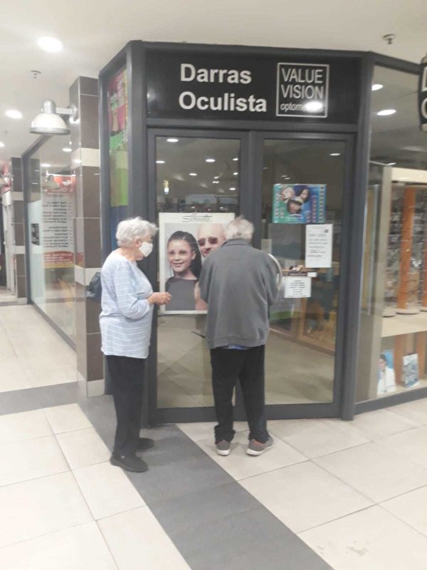 Cynette and Harold lock up after a rare after-hours visit to Darras Optometrists during the Covid-19 pandemic